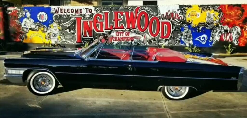 Classic black convertible car parked in Inglewood, California.