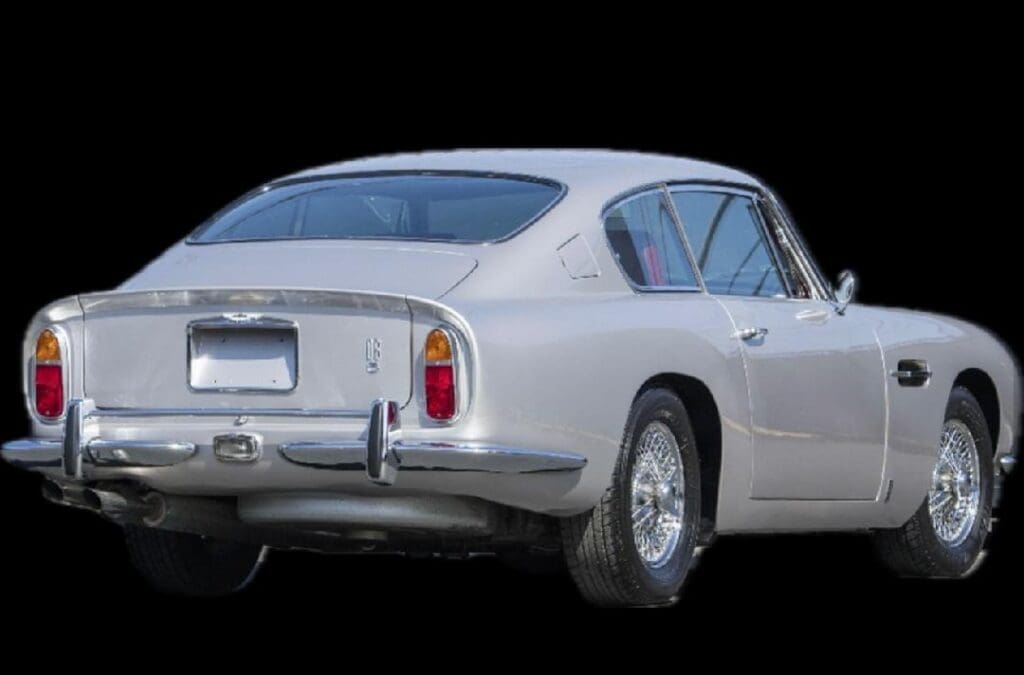 Classic silver sports car rear view with sleek design.