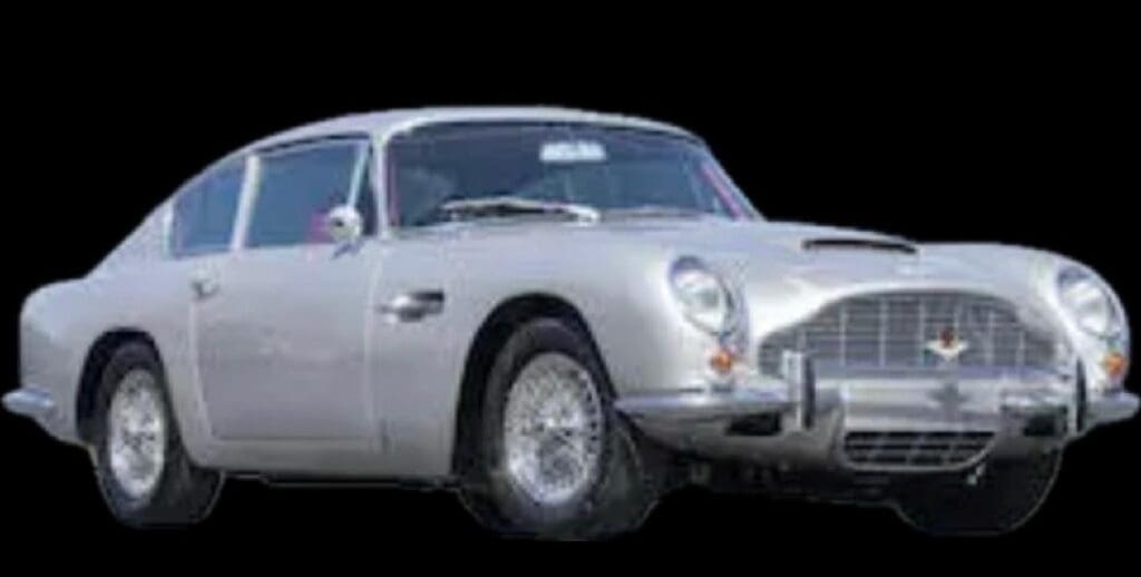 Classic silver vintage sports car with chrome details.