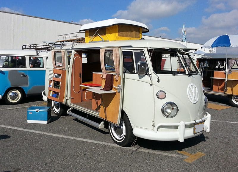 Vintage camper van with open doors.